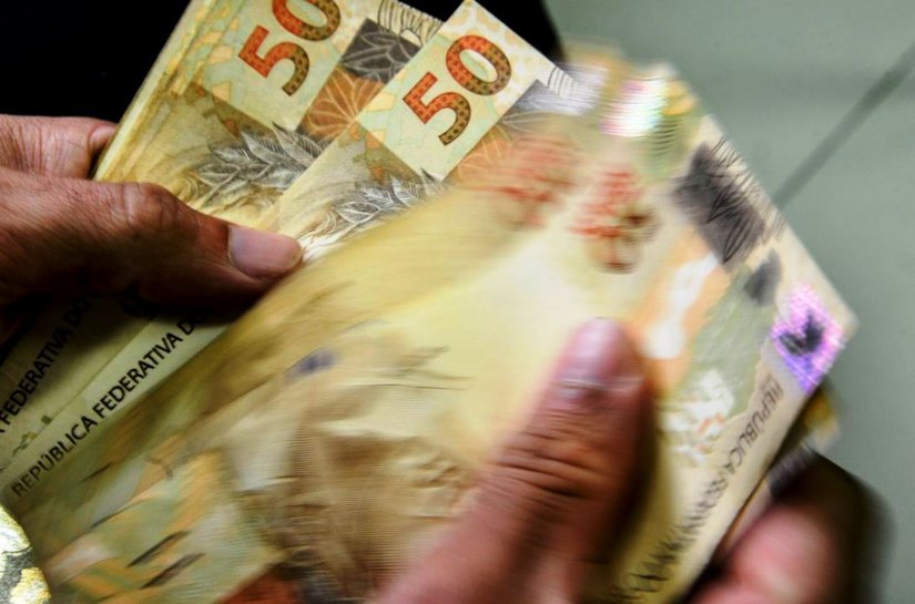 Sancionada lei que libera consignado para o Auxílio Brasil