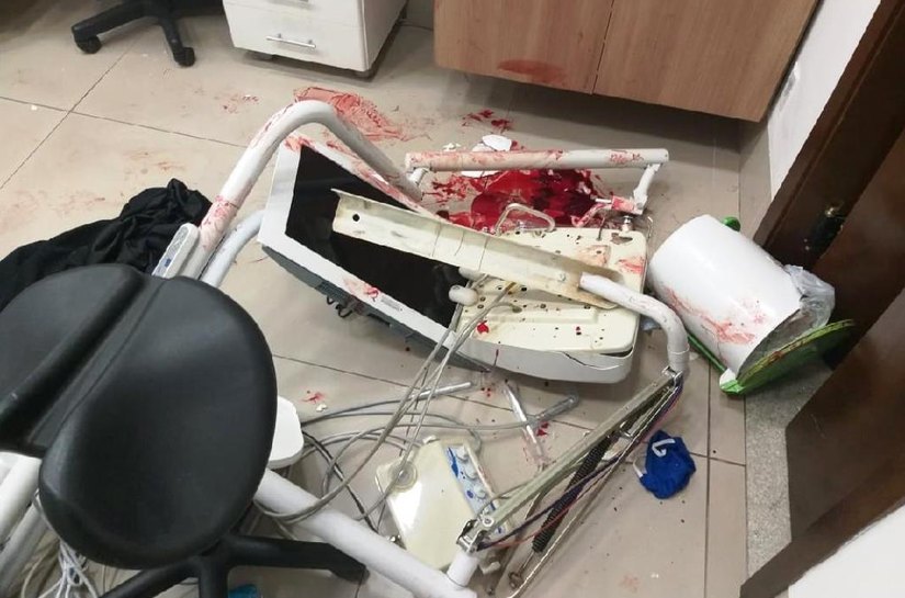 Assaltantes invadem clínica odontológica em Cuiabá no bairro Jardim Cuiabá, fazem reféns, e um acaba preso pela PM